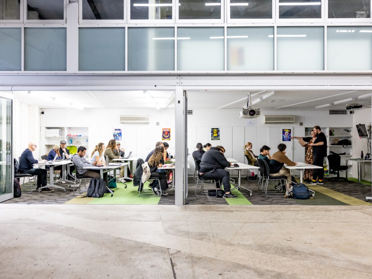 Workshop participants sitting at tables