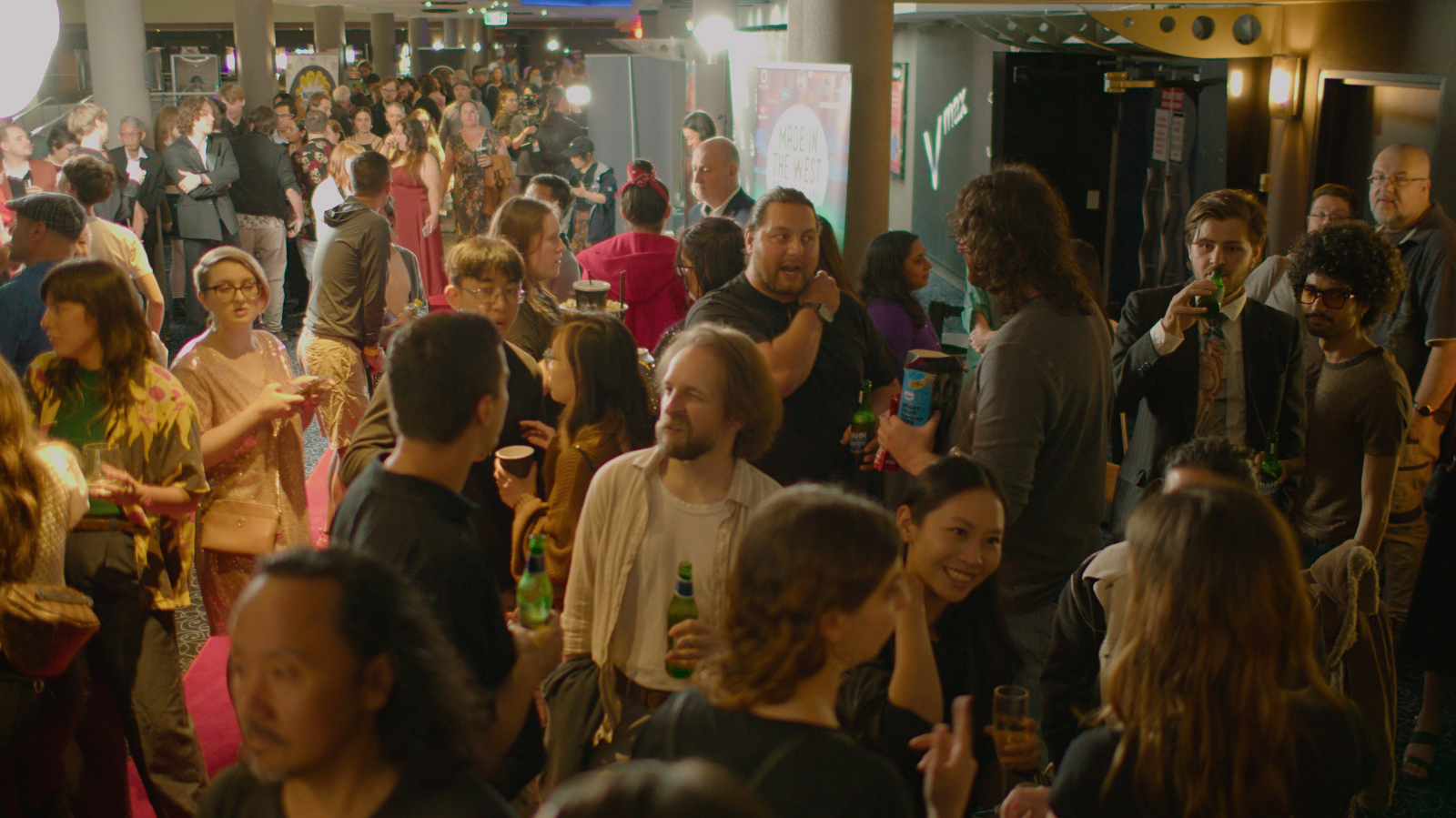 A large crowd gathers on the red carpet at Made in the West Film Festival