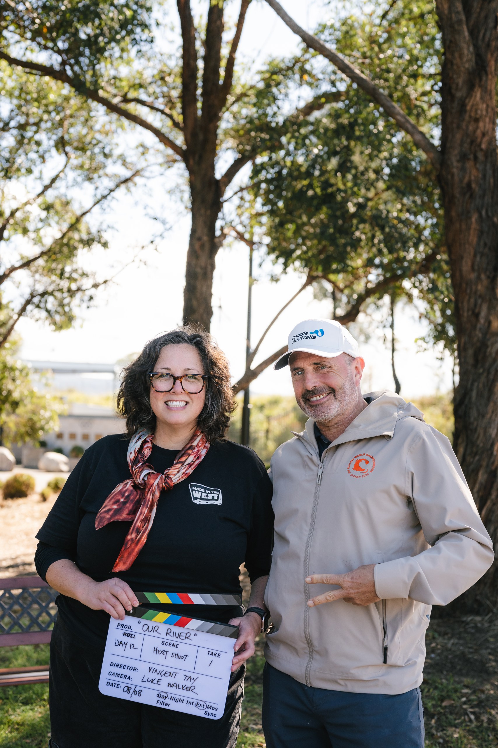 Producer Misty and host Richard smiling