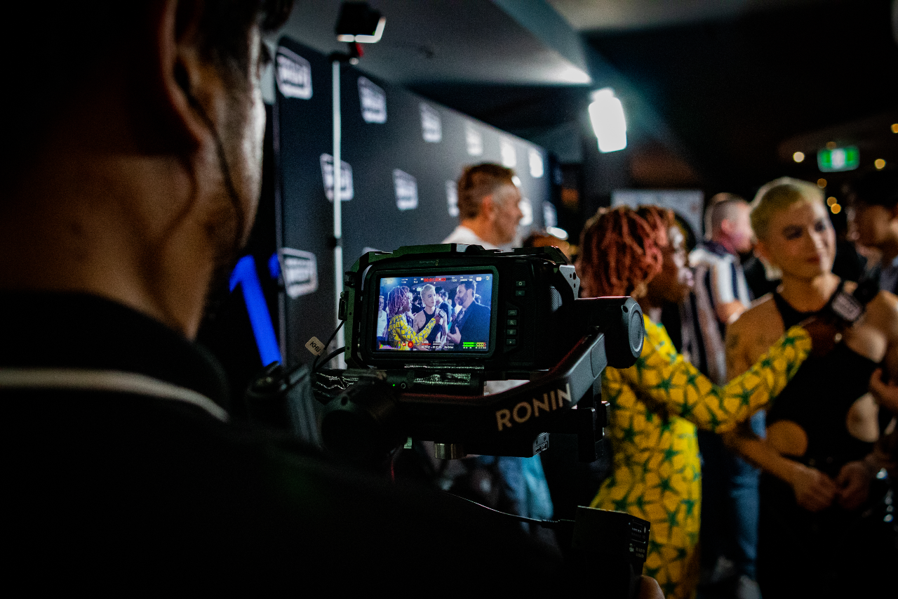 Looking behind the camera filming an interview